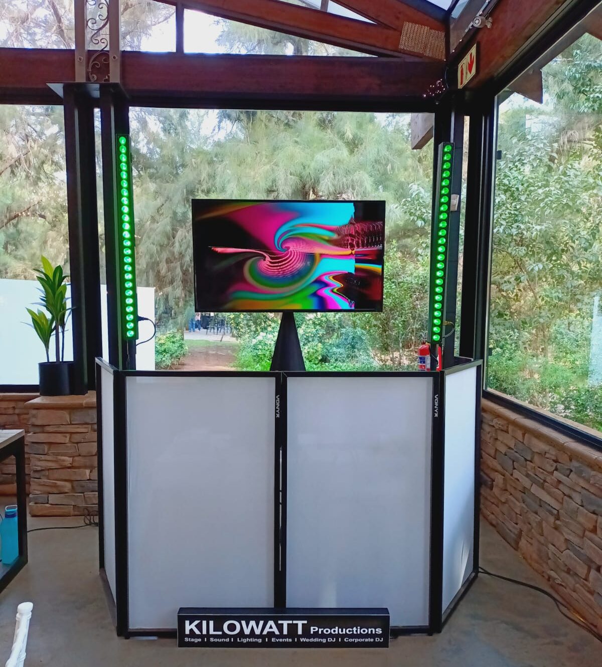 Mobile DJ package — DJ booth and speakers